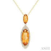 18x8 MM & 10x5 MM Oval Cut Citrine and 1/3 Ctw Round Cut Diamond Halo Semi-Precious Pendant With Chain in 14K Yellow Gold