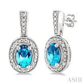 6X4 MM Oval Shape Blue Topaz and 1/50 Ctw Round Cut Diamond Semi-Precious Earrings in Sterling Silver