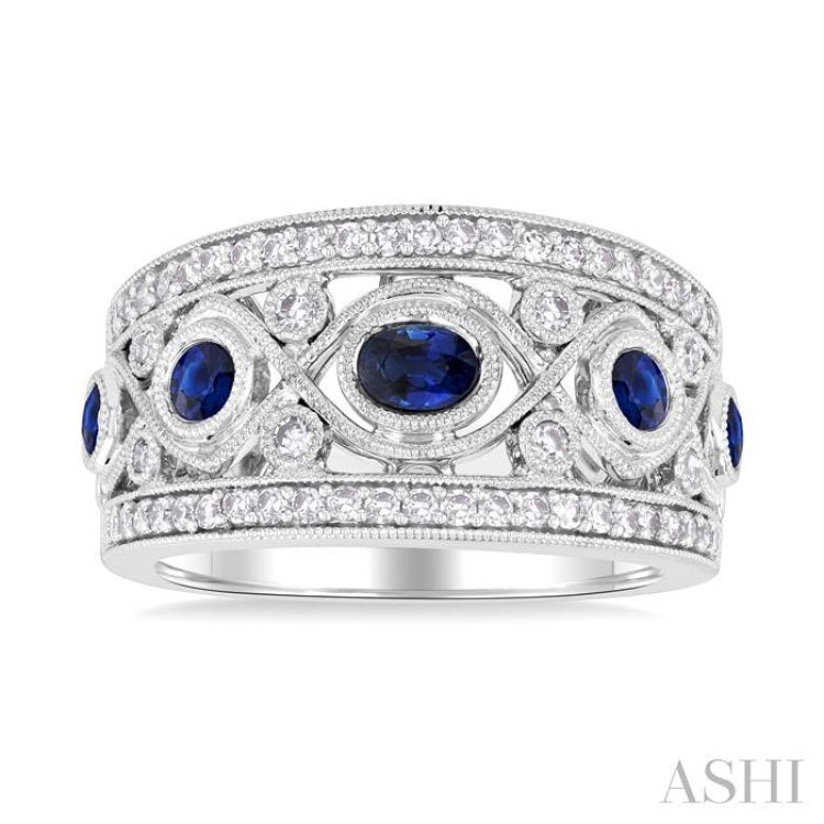 4x3 MM Oval, 2.8 MM and 2.4 MM Round Cut Sapphire and 3/8 Ctw Criss Cross Framework Single Cut Diamond Precious Band in 14K White Gold