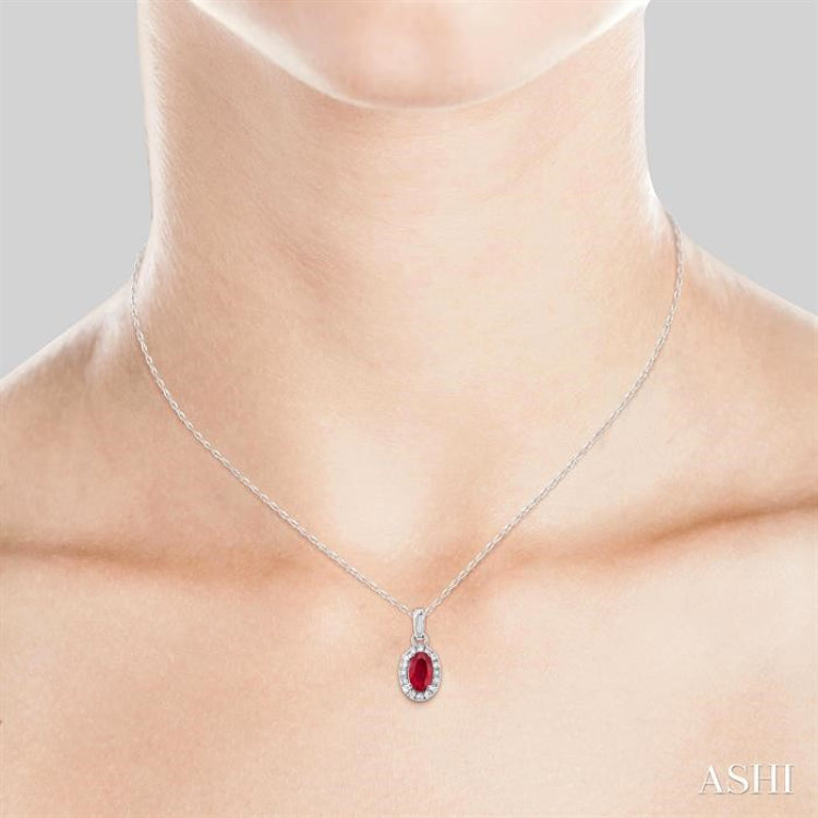 5x3 MM Oval Shape Ruby and 1/20 Ctw Round Cut Diamond Halo Precious Pendant with Chain in 10K White Gold