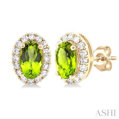5x3 MM Oval Shape Peridot and 1/8 Ctw Round Cut Diamond Halo Semi-Precious Stud Earrings in 14K Yellow Gold