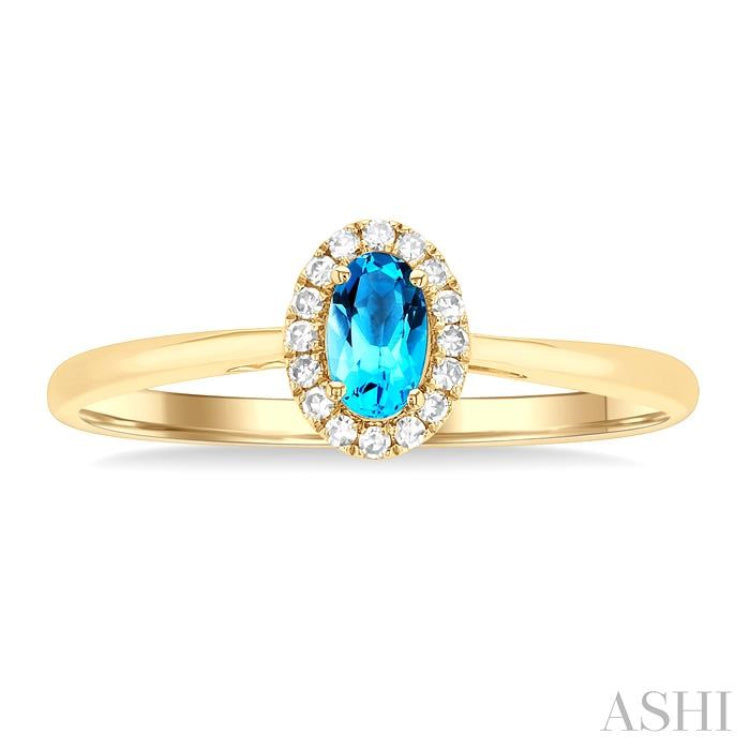 5x3 MM Oval Shape Blue Topaz and 1/20 Ctw Round Cut Diamond Halo Semi-Precious Ring in 14K Yellow Gold