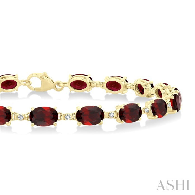 6X4 MM Oval Cut Garnet and 1/6 Ctw Round Cut Diamond Semi-Precious Tennis Bracelet in 10K Yellow Gold