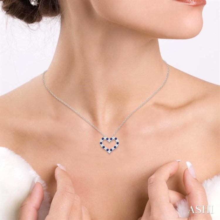 2.3 MM Round Cut Sapphire and 1/2 Ctw Open Heart Round Cut Diamond Precious Fashion Pendant With Chain in 14K White Gold