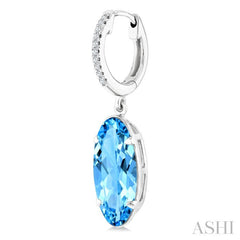 14X6 MM Oval Shape Blue Topaz and 1/10 Ctw Round Cut Diamond Semi-Precious Earrings in 14K White Gold