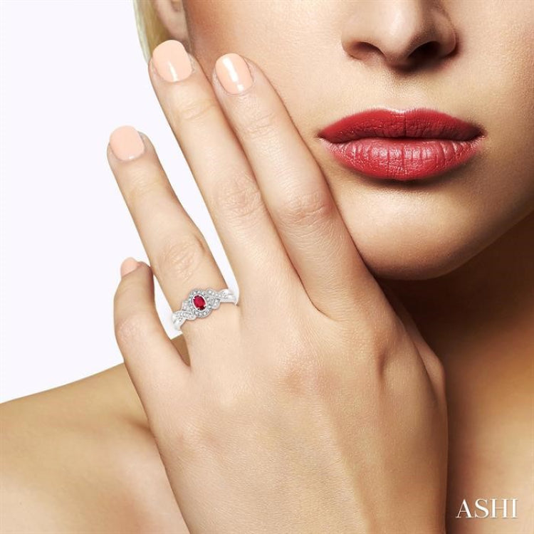 5x3 MM Oval Cut Ruby and 1/50 Ctw Round Cut Diamond Ring in Sterling Silver