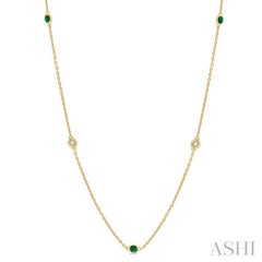 1.75 MM Emerald and 1/6 Ctw Round Cut Diamond Precious Station Necklace in 14K Yellow Gold